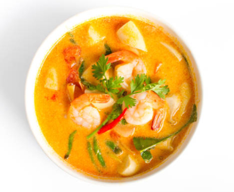 Image of tom yum soup in a bowl. 