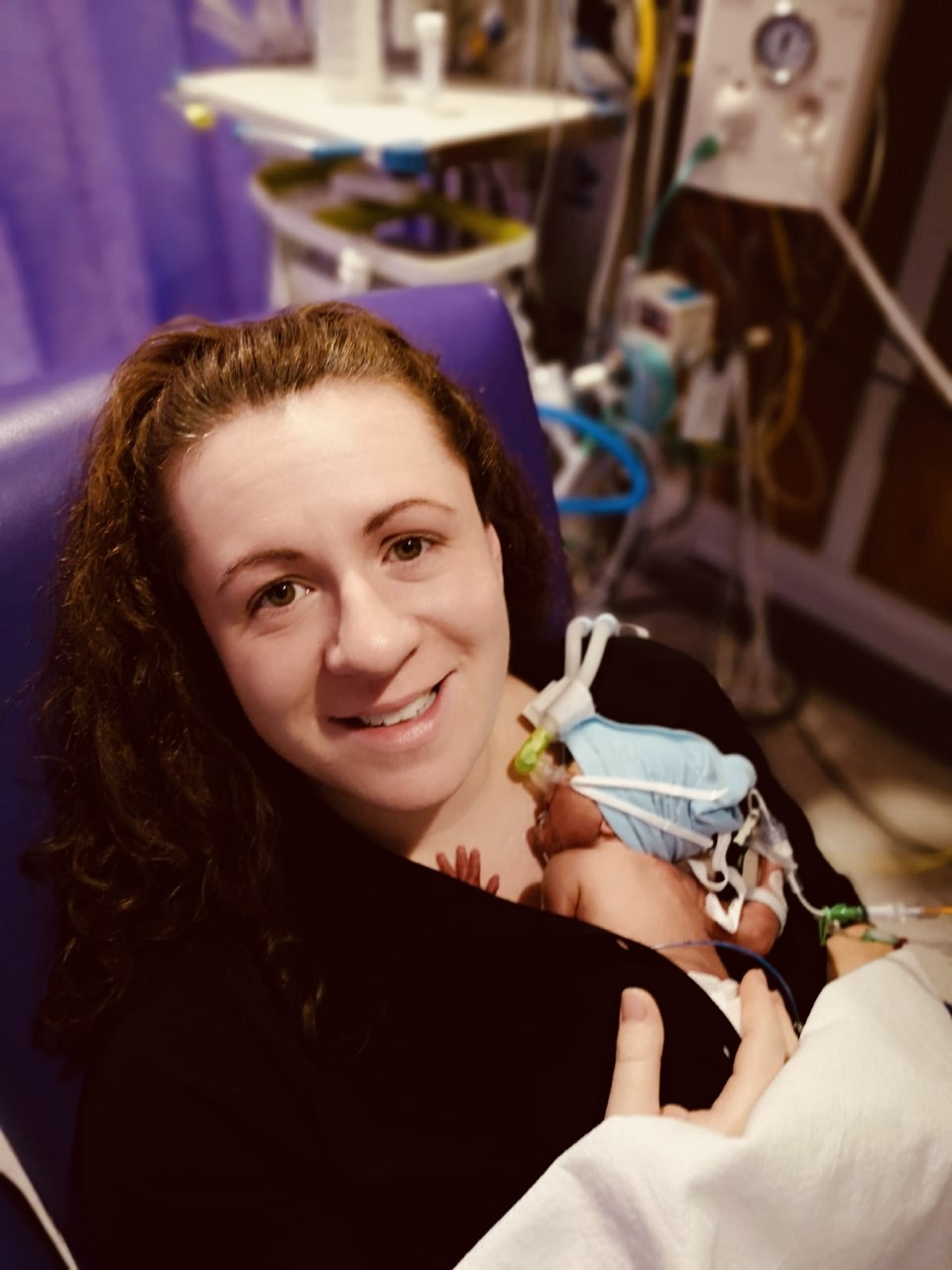 Rebekah in hospital holding baby Anwen skin to skin