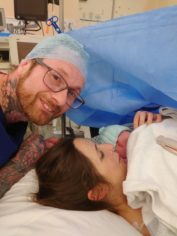Clare and Dan in the delivery room with their newborn baby Finn